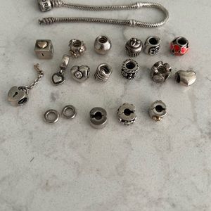 Pandora bracelet with beads, spacers, clips. Used